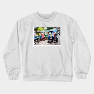 'Bangkok by Thailand' text over an illustration of colorful Thai Tuk-Tuks. Crewneck Sweatshirt